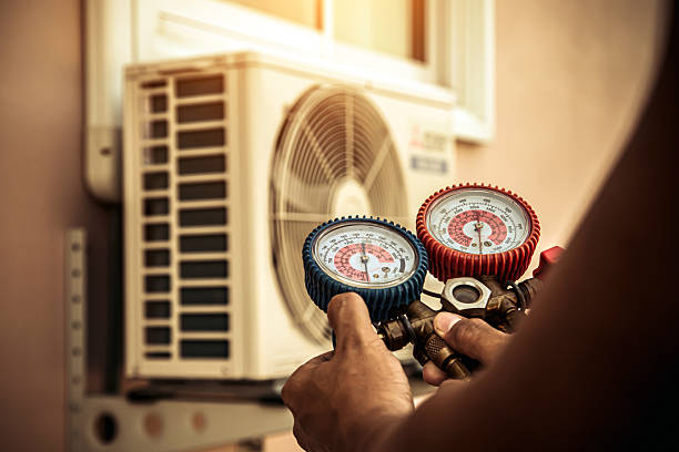 Professional Air Conditioning Service technician working in Salfordville, PA